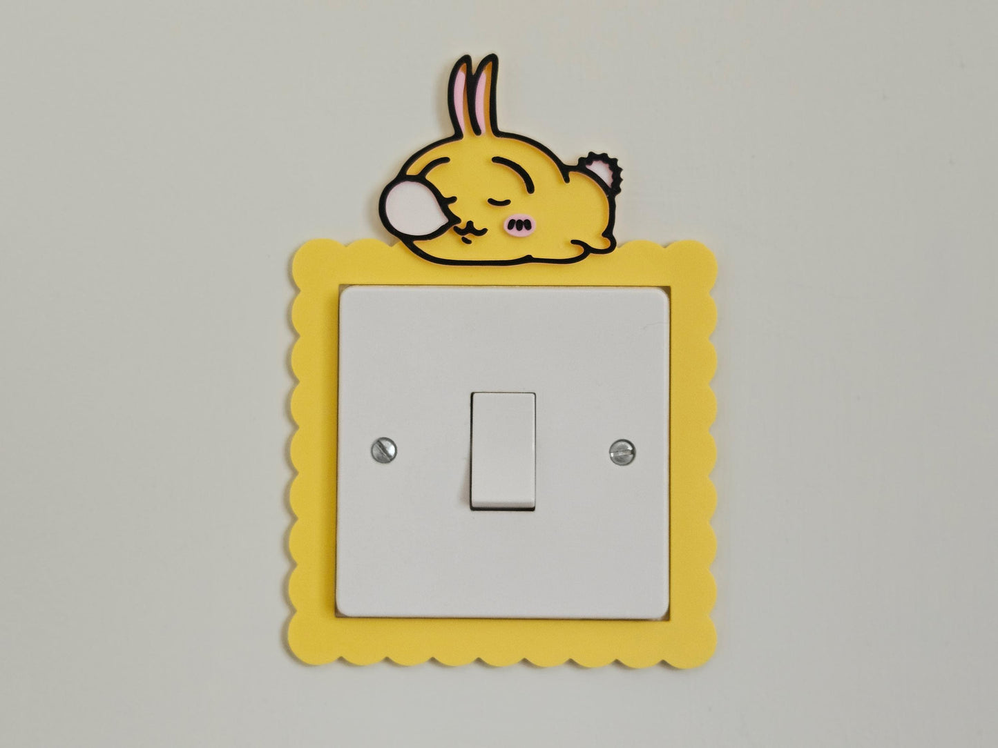 Usagi Sleeping on Lightswitch Cover