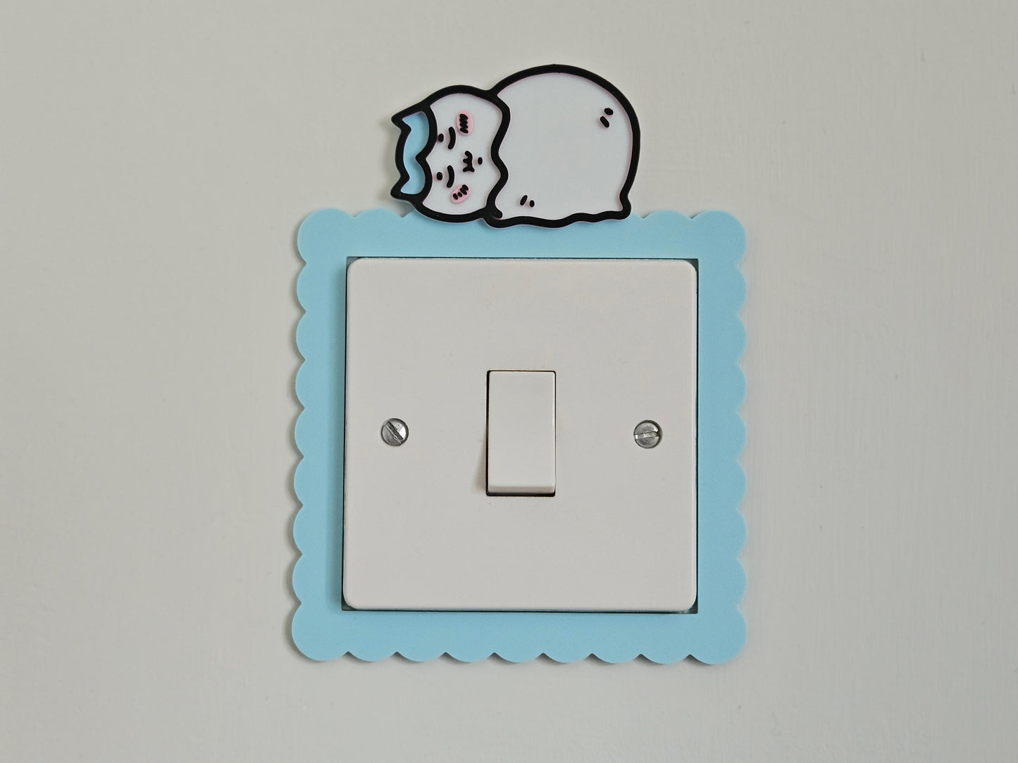 Hachiware Sleeping on Lightswitch Cover